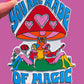 Magnet with colorful design of people under a mushroom and 'You are made of magic' text on a pink background.